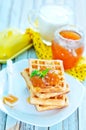 Waffles with apricot jam Royalty Free Stock Photo