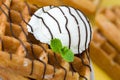 Waffles with chocolate sauce, ice cream and mint on yellow background Royalty Free Stock Photo