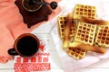 Waffles and cup of coffee on wooden table.French toast. Breakfast. Flat lay Royalty Free Stock Photo