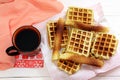 Waffles and cup of coffee on wooden table.French toast. Breakfast. Flat lay Royalty Free Stock Photo