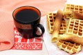 Waffles and cup of coffee on wooden table.French toast. Breakfast. Flat lay Royalty Free Stock Photo