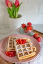 Waffles with fresh strawberries