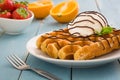 Waffles with ice cream on a blue wooden table Royalty Free Stock Photo