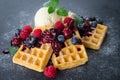 Waffles with ice cream and hot fruits sauce Royalty Free Stock Photo