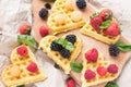 Belgian waffles with fresh raspberries and honey syrup