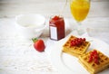 Waffles with red currant jam, orange juice and oat flakes oatmeal Royalty Free Stock Photo