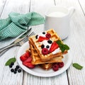 Waffles with strawberries, blueberry and milk Royalty Free Stock Photo