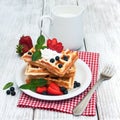 Waffles with strawberries, blueberry and milk Royalty Free Stock Photo