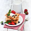 Waffles with strawberries, blueberry and milk Royalty Free Stock Photo