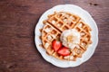 Waffles with strawberries and ice cream Royalty Free Stock Photo