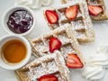 Waffles with strawberries and jelly Royalty Free Stock Photo