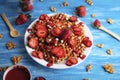 Waffles with strawberry on white plate on blue background. Royalty Free Stock Photo