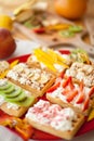 Waffles with whipped cream and fresh fruits on the top Royalty Free Stock Photo