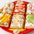 Waffles with whipped cream and fresh fruits on the top Royalty Free Stock Photo