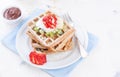 Waffles with wholewheat flour and fruits on a white plate Royalty Free Stock Photo