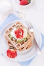 Waffles with wholewheat flour and fruits on a white plate Royalty Free Stock Photo