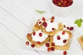 Waffles with wild strawberries and whipped cream Royalty Free Stock Photo