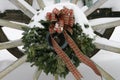 Wagaonwheel wreath with Snow Royalty Free Stock Photo