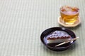 Wagashi, japanese traditional confections served with mugicha Royalty Free Stock Photo