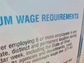 Wage Requirements sign about minimum wage law 21-5C Royalty Free Stock Photo