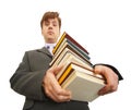 Waggish man holding pile of textbooks