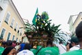 Wagon with the caboclo is pushed by men during the Bahia independence parade, in Pelourinho in Salvador