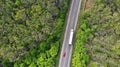 Wagon truck and red car driving on the highway, aerial. Royalty Free Stock Photo