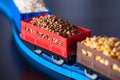 Wagons with grain of buckwheat, rice and peas. Grain Cultures. Royalty Free Stock Photo