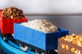 Wagons with grain of rice, peas and buckwheat. Grain Cultures. Royalty Free Stock Photo