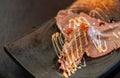 Wagyu beef sushi topped with orange ebiko placed on a Japanese plate Royalty Free Stock Photo