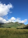 Waianae Valley with Pyramid and Rainbows in December on Oahu Island, Hawaii. Royalty Free Stock Photo