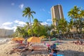 Waikiki beach sunbathing Royalty Free Stock Photo