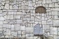 Wailing Wall at Remuh Cemetery built with fragments of Jewish tombstones , Krakow, Poland.