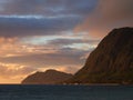 Waimanalo beach, bay, and Makapuu Point with Makapu& x27;u Lighthouse visible on cliffside mountain on windward coast at dawn Royalty Free Stock Photo