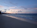 Waimanalo Beach looking towards Mokulua islands at dusk Royalty Free Stock Photo