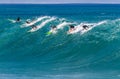 Waimea Bay HI, Surfers riding a wave Royalty Free Stock Photo