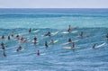 Waimea bay Oahu Hawaii, A group of surfers wait for a wave to surf