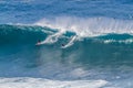 Waimea bay Oahu Hawaii, Surfers ride a big wave Royalty Free Stock Photo