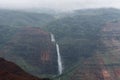 Waimea Canyon and Waipoo Falls on Kauai, Hawaii, in winter after a major rainstorm Royalty Free Stock Photo