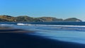 Wainui Beach with great view of nearby mountain ridges in Gisborne, Hawkes Bay in New Zealand