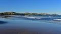 Wainui Beach with great view of nearby mountain ridges in Gisborne, Hawkes Bay in New Zealand