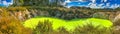 Waiotapu Thermal Track, beautiful colors under a blue sky, panoramic view