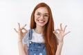 Waist-up friendly cheerful happy redhead girl show okay sign, laughing pleased agree idea good, give positive judgement Royalty Free Stock Photo