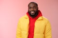 Waist-up happy charismatic good-looking bearded guy in yellow jacket red hoodie smiling joyfully white perfect smile