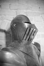 Waist up and helmet of ancient armor from medieval war (black and white) Royalty Free Stock Photo