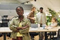 Young African-American Woman Posing Confidently in Office Royalty Free Stock Photo