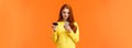 Waist-up portrait carefree modern young girl making online purchase, shopping internet using mobile application, insert Royalty Free Stock Photo