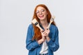 Waist-up portrait charismatic smiling, happy and creative redhead woman in glasses, laughing joyfully showing