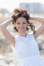 Waist up portrait of cute girl in white Royalty Free Stock Photo