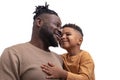 Waist up portrait of dark skinned African male and his little son spending time together, isolated